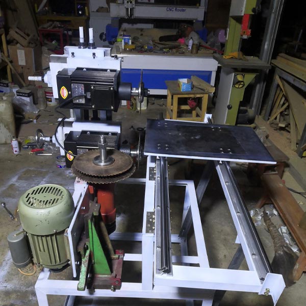 trục cưa bàn làm máy cắt gỗ